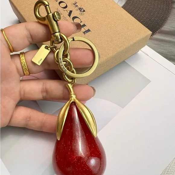 Coach Sparkling Red and Gold Pear Key Holder - Picture 2 of 6